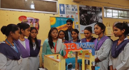 Learners presenting a retail business simulation project