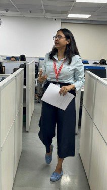Trainer leading a session in a modern workplace