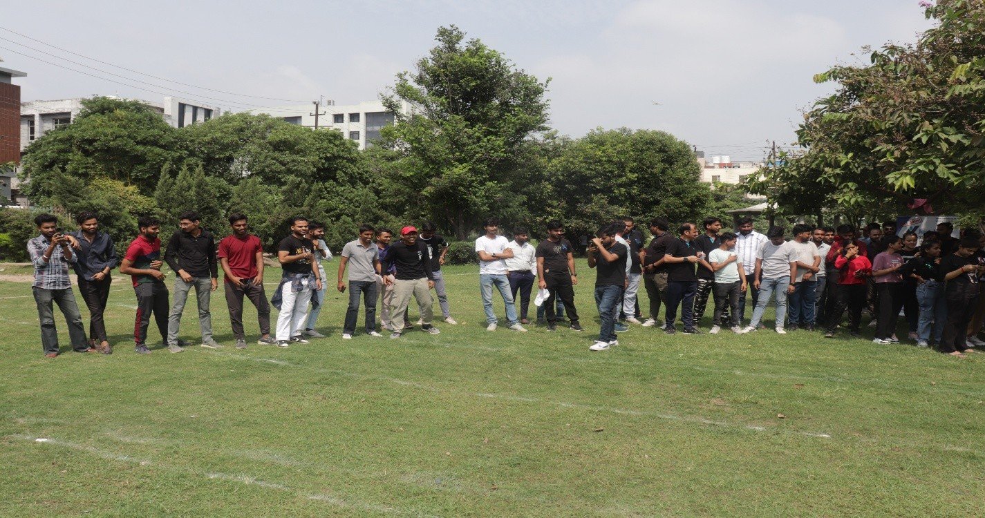 Large group taking part in an outdoor training activity