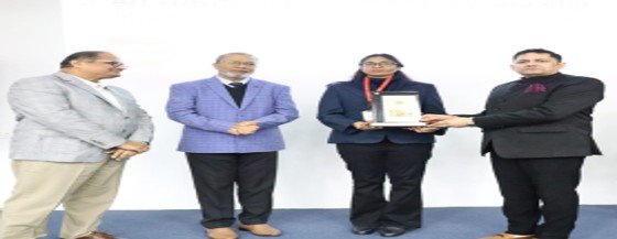 XETA trainer receiving an award with colleagues