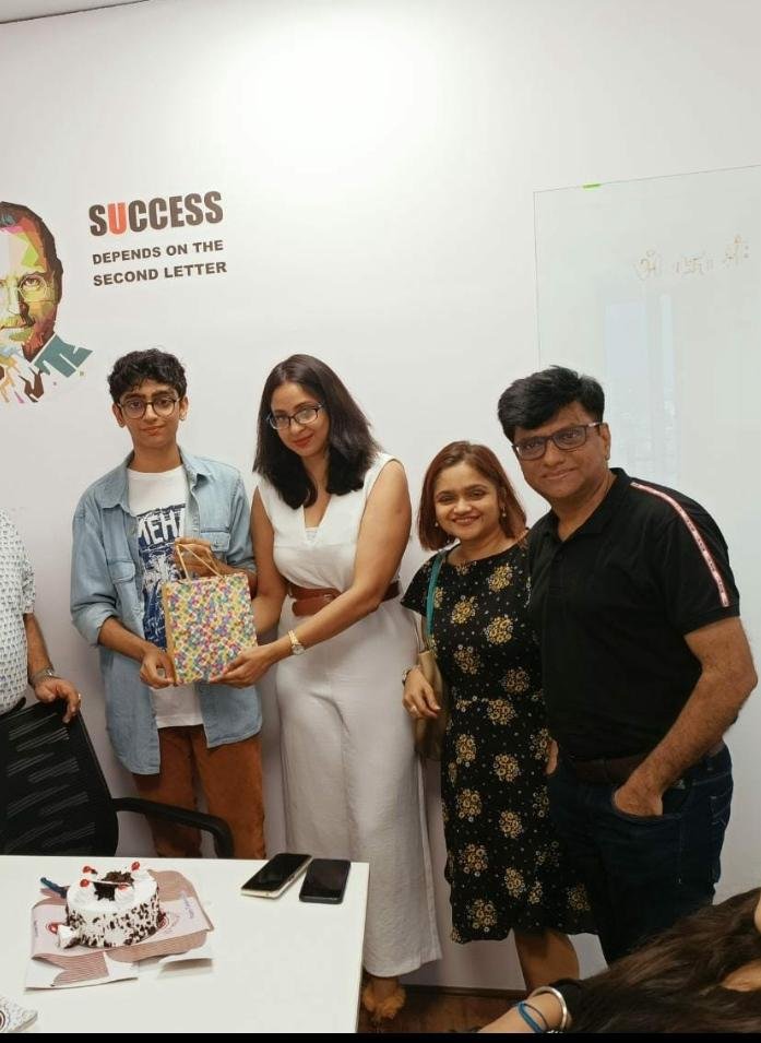 Priyanka and colleagues celebrating a learner milestone