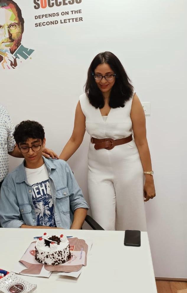 Priyanka encouraging a learner during a celebration